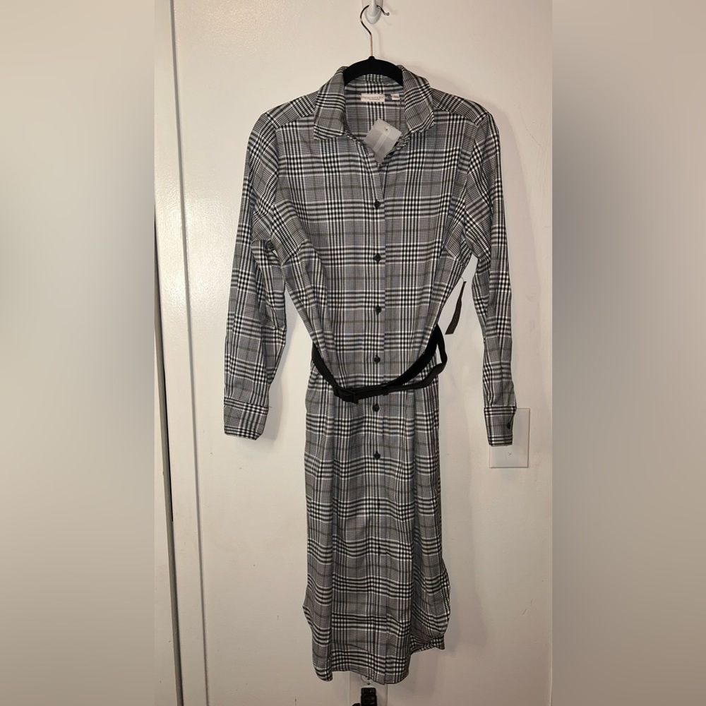 Black and white dress can be worn as a coat also.